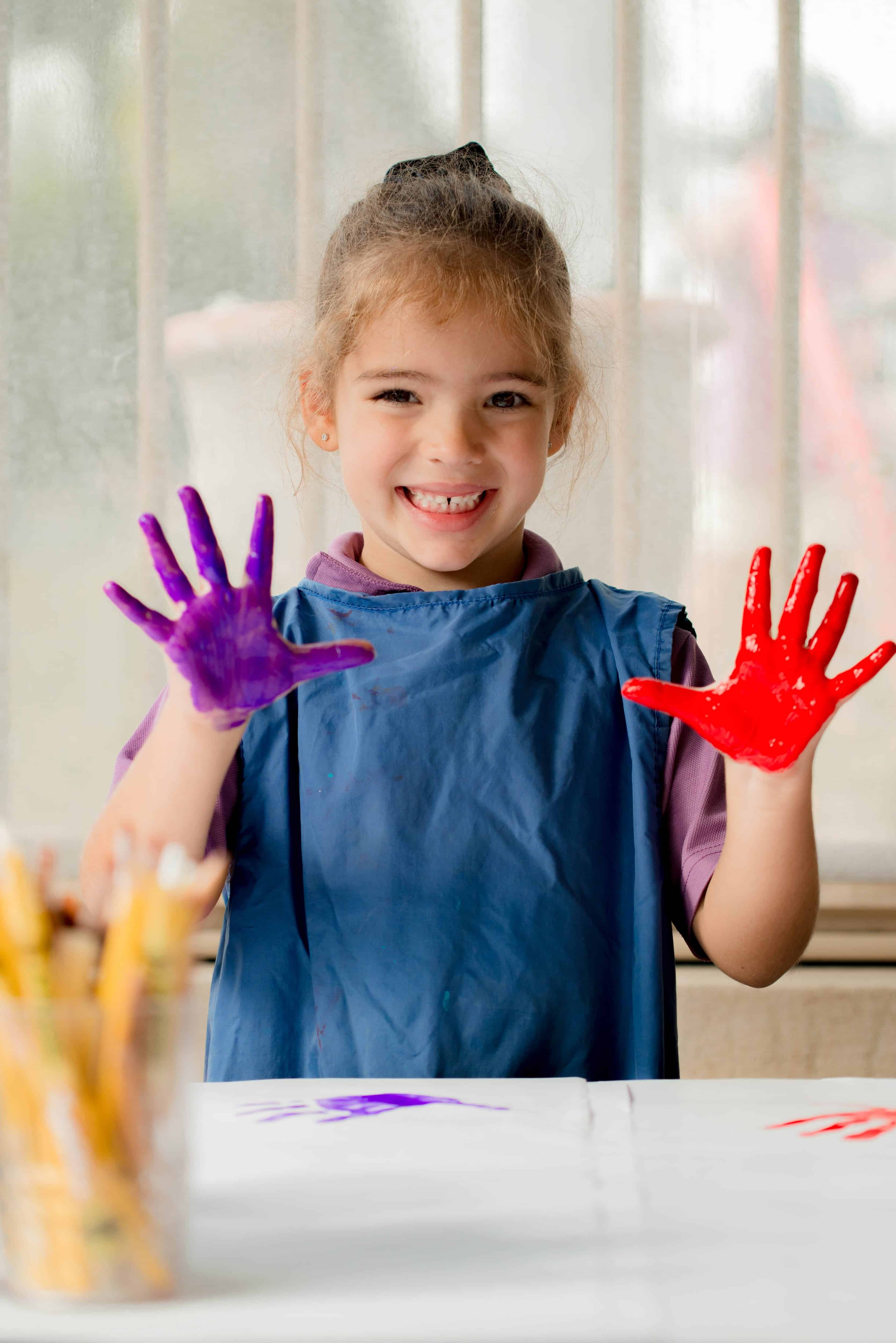 Early Childhood Education Finger Painting at Newman College